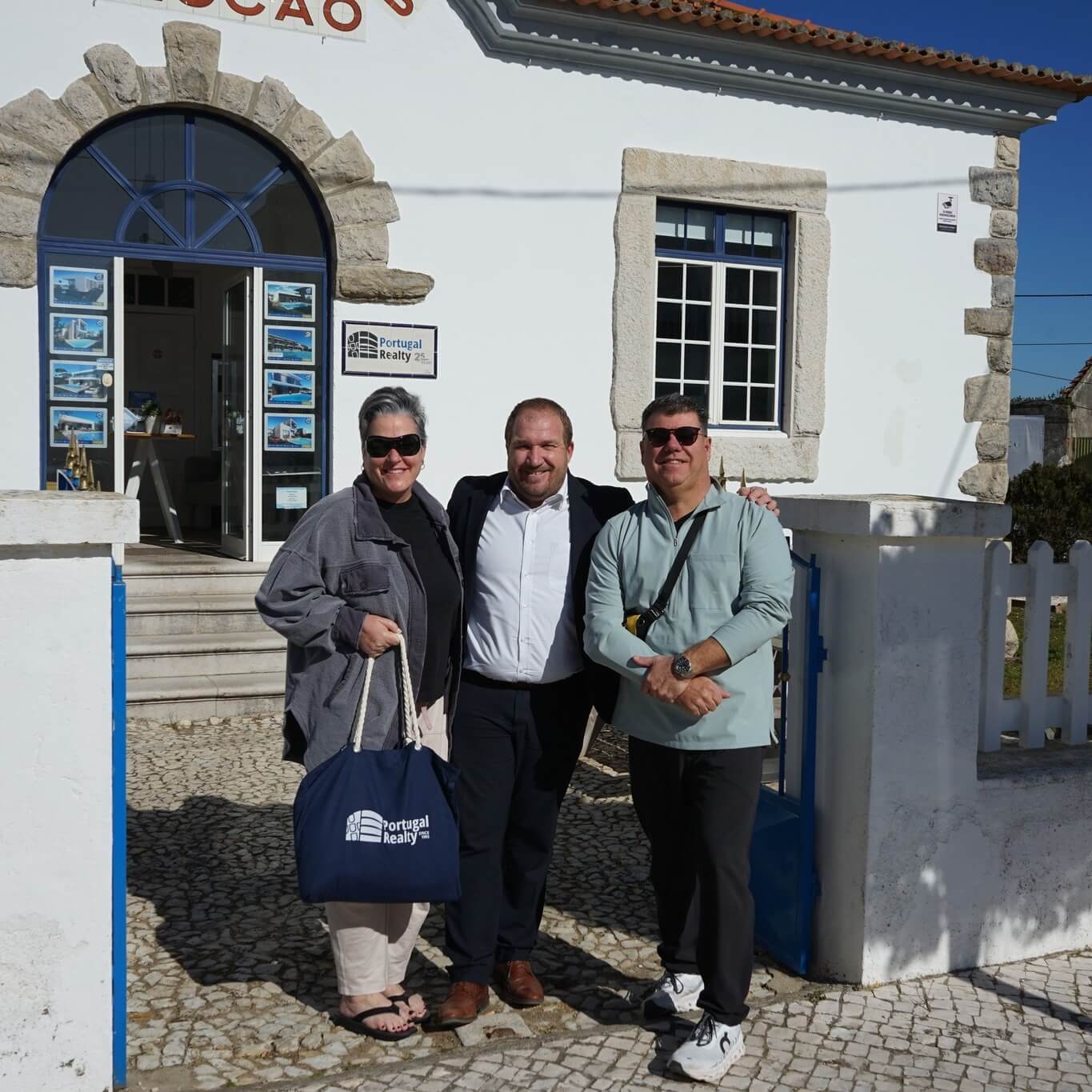 Amy and Jeff a Canadian couple with Sales Director Dylan Herholdt at Portugal Realty office in Sao Martinho do Porto - Portugal