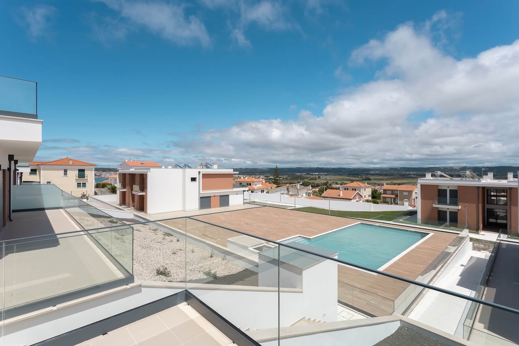 View of outdoor pool and deck area at Sant'Ana Bay Apartments in Silver Coast Portugal