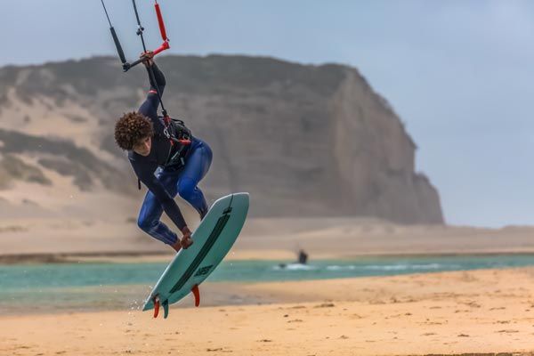 Surfer at Foz d Arelho Beach